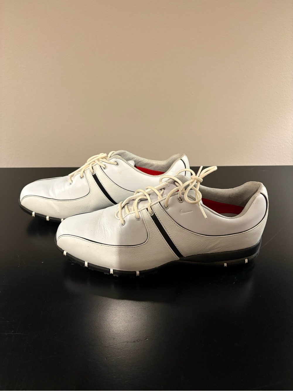 Nike women’s White and Black Athletic Golf Shoes with Red Lining